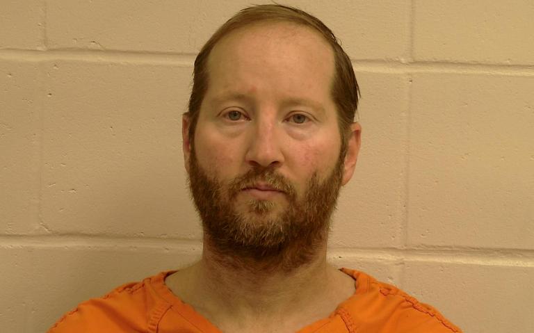 Eric Reinbold, Pennington County booking photo