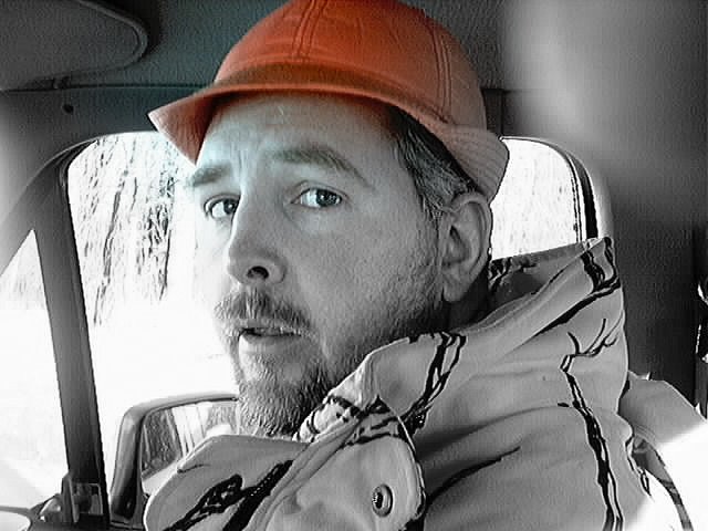 Arlan in orange Hunting cap