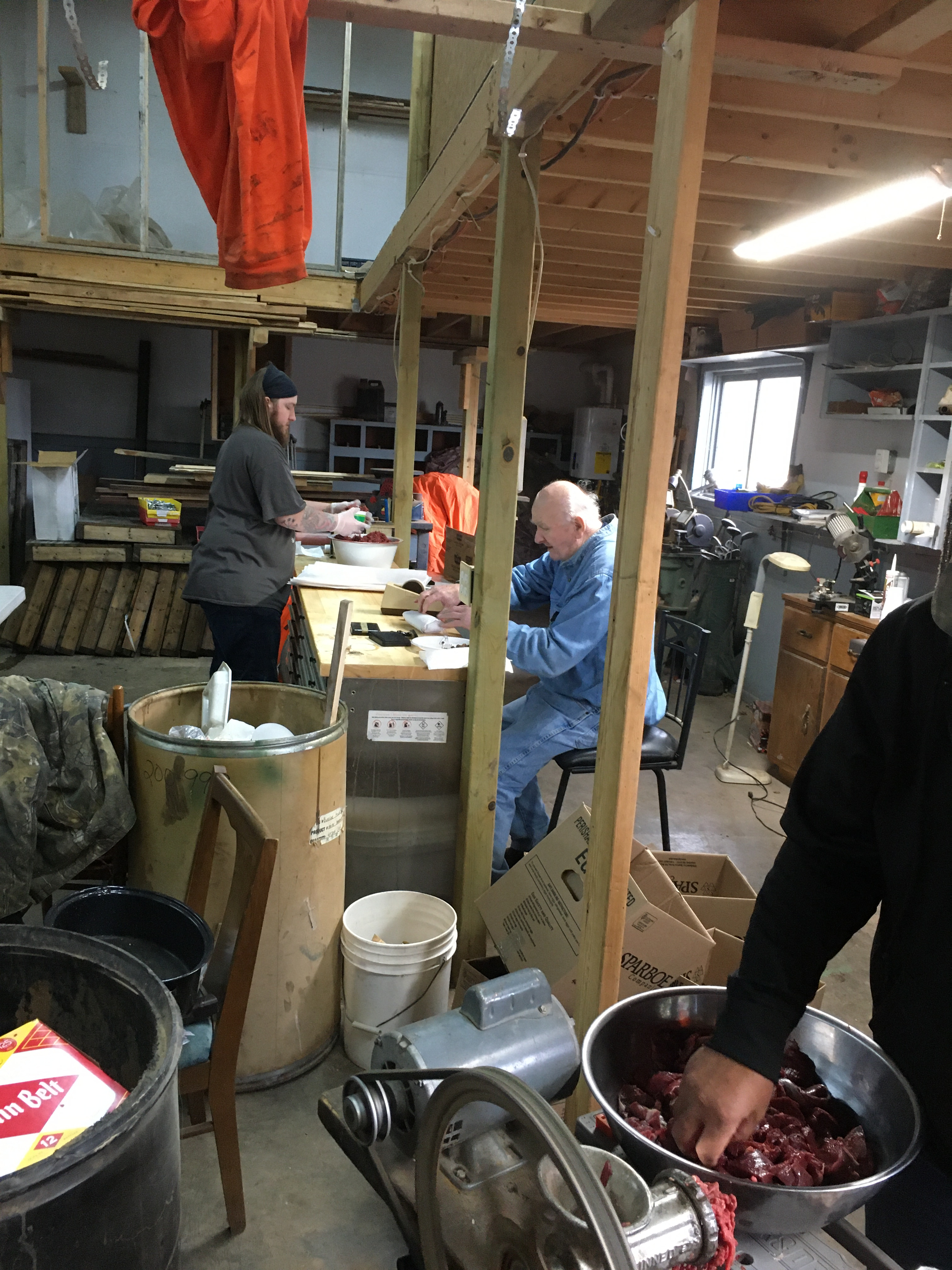 Bob and Matt packaging meat