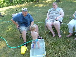 Orin playing in the little pool